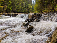 The Small Waterfall In The Ukrainian Carpathian Mountains