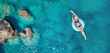 © biletskiyevgeniy.com - Aerial view at the girl on sea. Turquoise water from air as a background from air. Natural seascape at the summer time. Seascape from drone