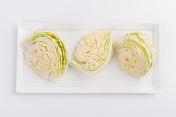 Canvas Print - Sliced cabbage in white plate