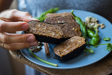 Raw Vegan Flax Seeds Bread Bars With Pumpkin And Sunflower Seeds In Nori Seaweed Leaves. Vegan, Vegetarian, Healthy Food