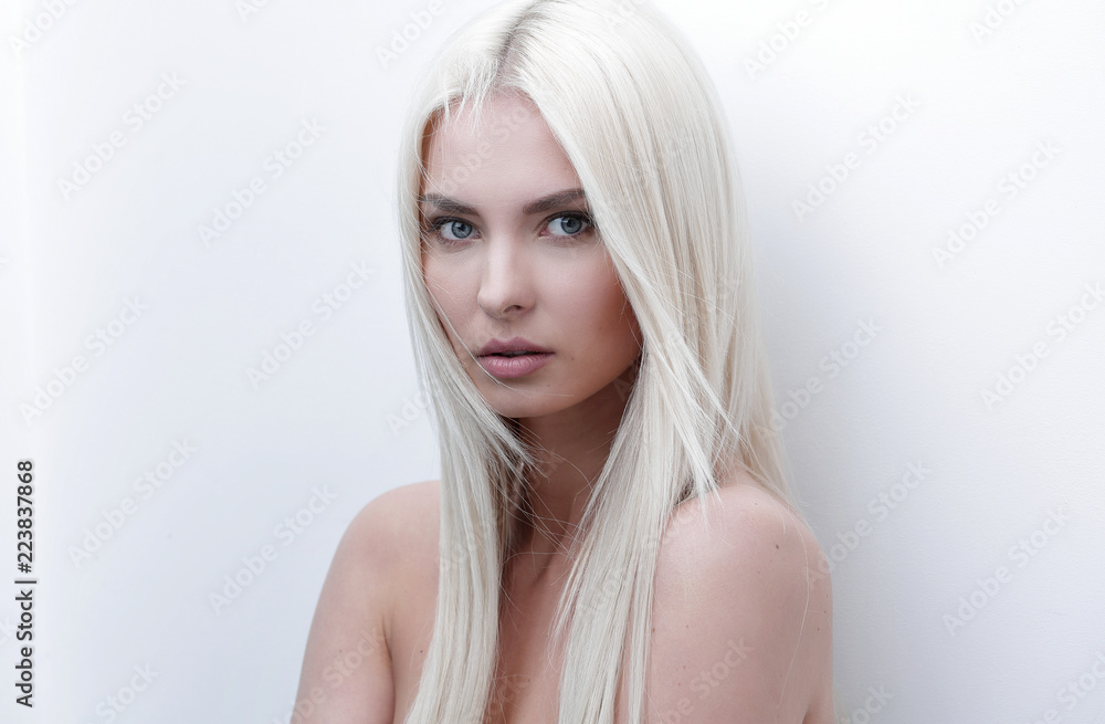 Close-up of a sad beautiful blonde woman - obrazy, fototapety, plakaty 
