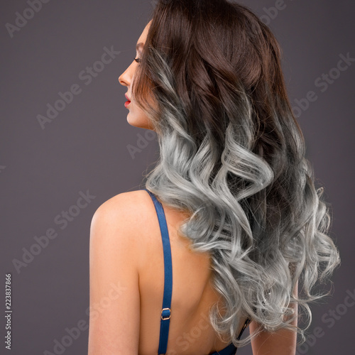 Woman With Long Healthy Colorful Ombre Grey Wavy Hair Close Up Of