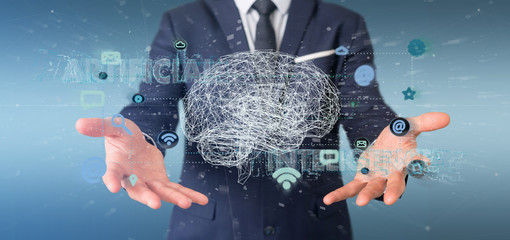 Businessman holding a 3d rendering artificial intelligence concept with a brain and app