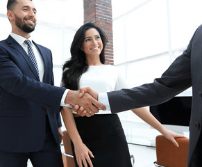 handshake of business people on the background of the office