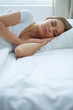 © lenets_tan - Beautiful young blonde woman sleeping in bed