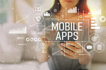 Mobile apps with woman using her smartphone on a couch