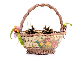 Wall Mural - Basket with cones on white background isolation