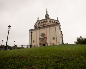 Wall Mural - The church of Crespi d'Adda, in Italy, is a copy of the Renaissance church (Bramante school) in Busto Arsizio. In this perfect little world, the owner Crespi 