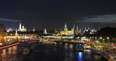 Wall Mural - Timelaps, the movement of water and motor transport on the river and embankment near the Kremlin and Moscow river from Zaryadye urban landscape park. Moscow, Russia.