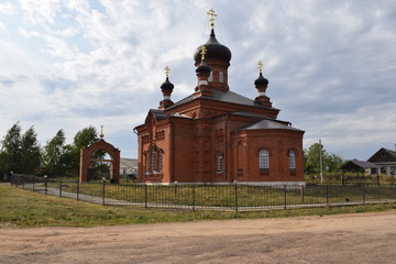 Village. Church. Sky