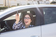 © satura_ - Young Happy Woman Showing The Key Of New Car