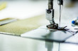 © kavee29 - sewing machine with thread and item of clothing in sewing room