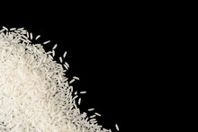 Raw White Rice Isolated On Black Background Food Object Design Top View