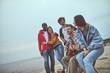 © Yakobchuk Olena - Indie music. Group of happy friends having good holiday experience while spending time together at the seaside