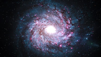 Wall Mural - Spiral galaxy rotating in outer space on star field flare light at center. Contains public domain image by NASA