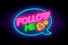 Follow me neon sign on the brick wall with hearts and speech bub