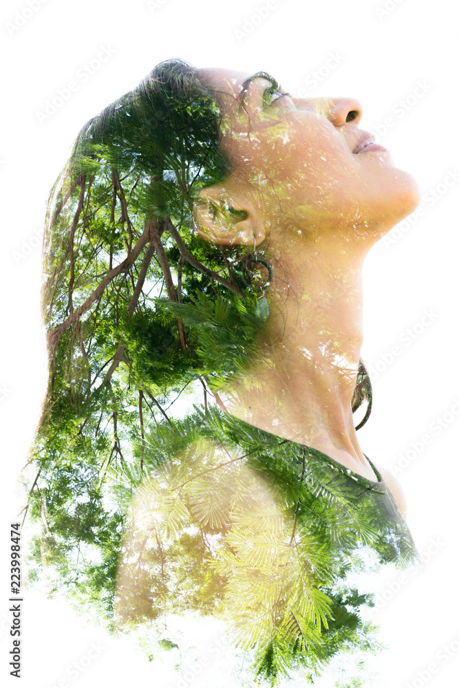 Double exposure portrait of a naturally beautiful happy woman and a ...