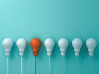 Fototapete - Think different concept One hanging orange light bulb standing out from the white light bulbs on blue pastel color  wall background leadership and individuality creative idea concepts 3D rendering