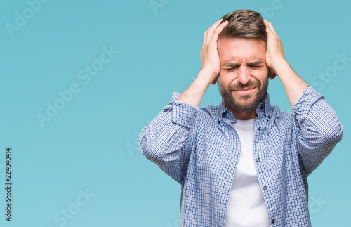 Fotomural Young handsome man wearing white t-shirt over isolated background suffering from headache desperate and stressed because pain and migraine