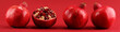 Ripe Pomegranates. sliced and whole pomegranate on a table.