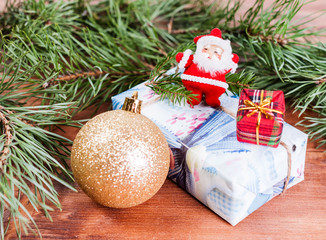 Christmas gift boxes, spruce branches and Christmas balls