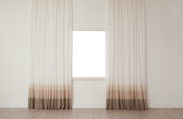 White wall with modern window and curtains indoors. Living room interior