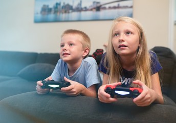 Wall Mural - Children playing video games 