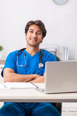 Young doctor working in the hospital