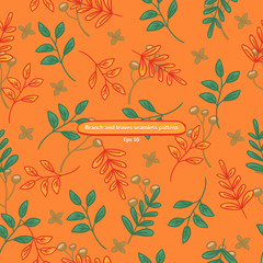 Wall Mural - Branch with leaves on orange background cartoony seamless pattern