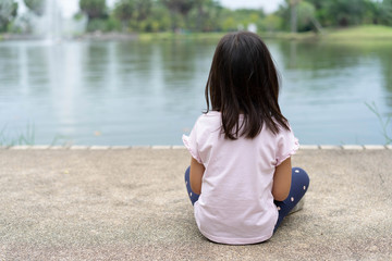 Portrait Asian kids little girl Sitting back