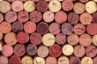 © laplateresca - Wine corks background, overhead photo of red and white wine corks