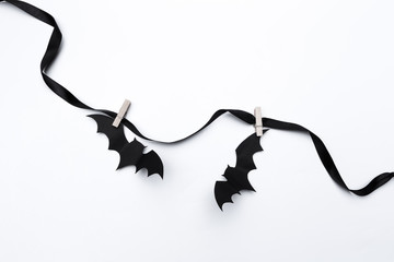 Wall Mural - halloween and decoration concept - paper bats flying