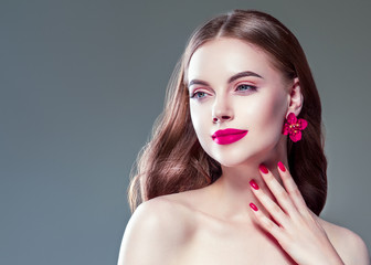 Beautiful woman with manicured nails beautiful hands and hairstyle