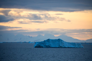 ice in the Antarctica with iceberg in the ocean