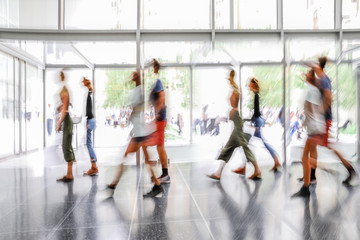 group of people in the lobby business center