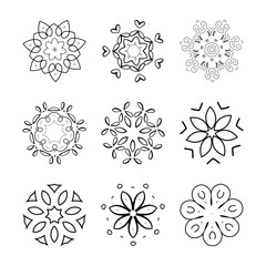 Wall Mural - Set of nine abstract round patterns isolated on white background. Vector design elements.