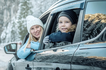 Happiness caucasian smiling boy with his mother looking 