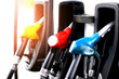 red green yellow orange color fuel gasoline dispenser  background energy crisis