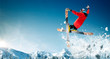 © Artur Didyk - Skiing. Jumping skier. Extreme winter sports.
