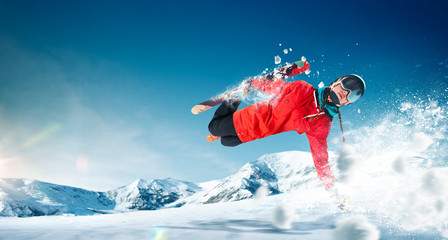 Wall Mural - Skiing. Jumping skier. Extreme winter sports.