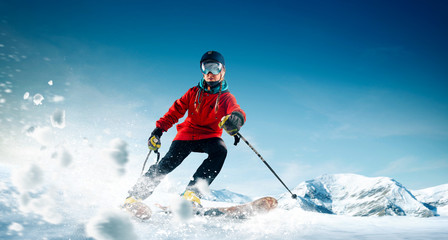 Wall Mural - Skiing. Jumping skier. Extreme winter sports.