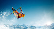 © Artur Didyk - Skiing. Jumping skier. Extreme winter sports.