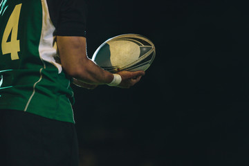 Wall Mural - Rugby player with ball in hand