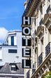 Hotel sign on facade of a building. Paris, France