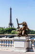 Pont Alexandre III Bridge (details) and Eiffel Tower. Paris, France
