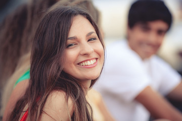 portrait of a happy latin girl on the street