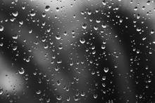 Rain Drops On Window Glass. Natural Gray Water Background