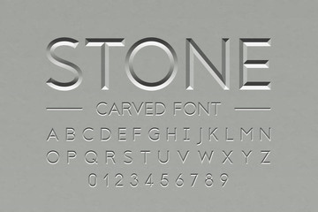 Stone carved font, alphabet letters and numbers