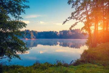 Poster - Early morning, sunrise over the lake. Rural landscape, wilderness. Beautiful nature of Finland, Europe