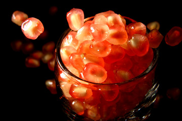 Wall Mural - Pomegranate Seed on black background